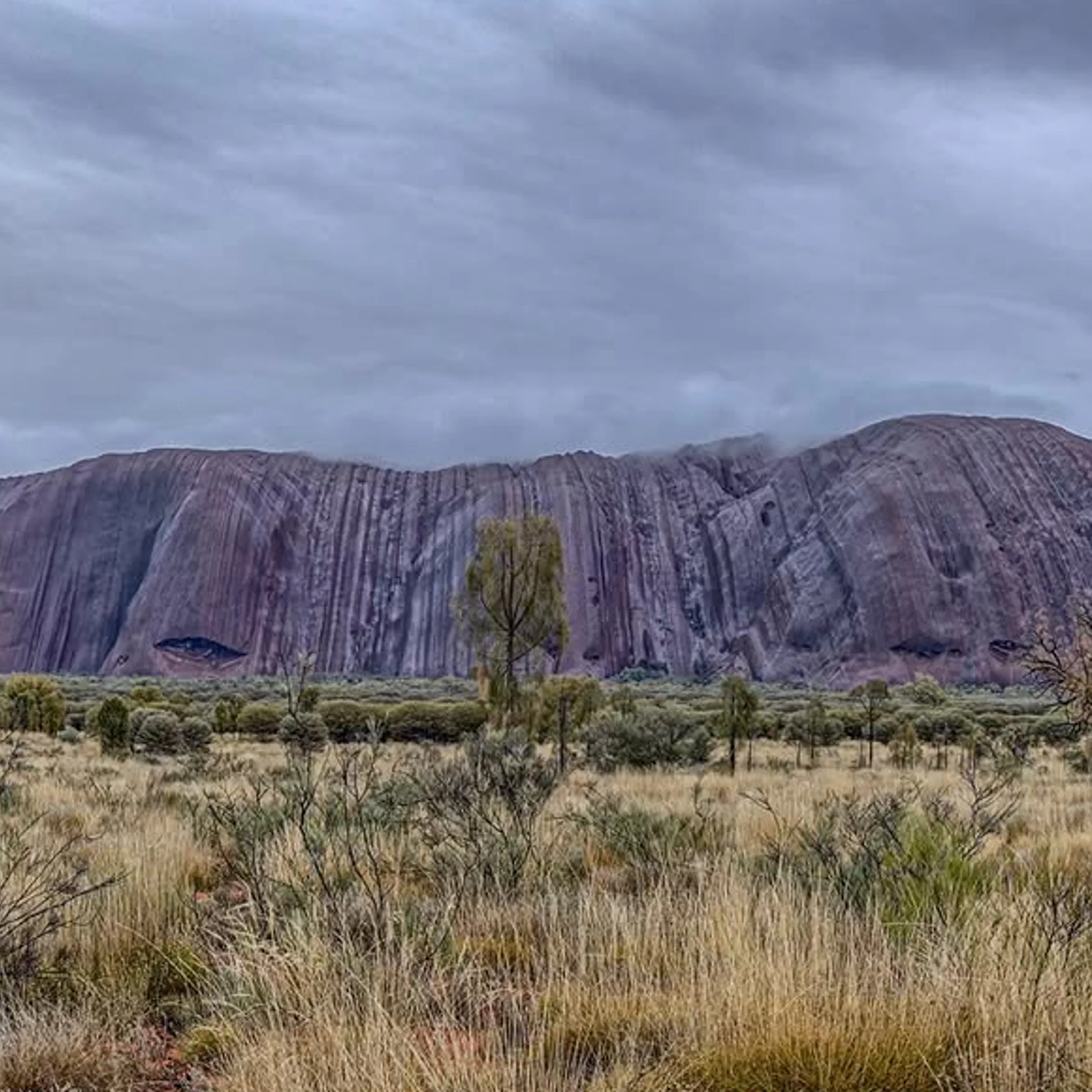 uluru dawn cold morning light clothing detail