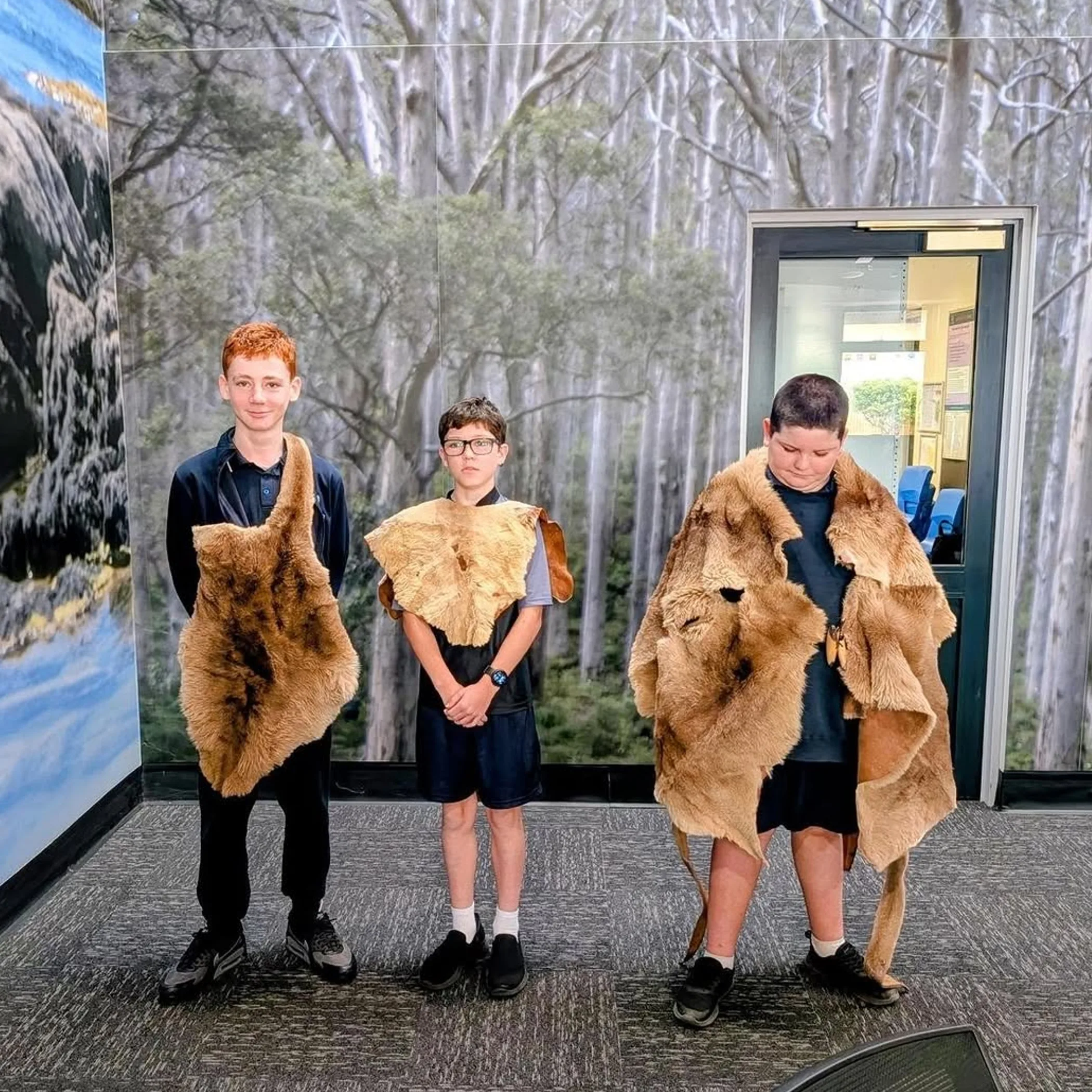 students engaging with aboriginal artefacts